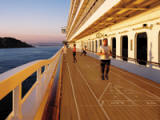 Promenade Deck - Walking is the number one exercise in the world, and walking along a 360-degree teak deck surrounded by breathtaking vistas witnessed only at sea, is to truly experience one of the greatest privileges of ocean travel. - Deluxe Cruises 2024-2025-2026-2027