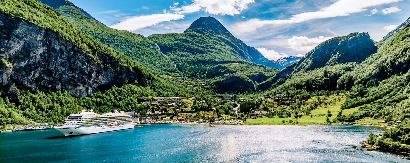 Viking ocean ship sailing through Geirangerfjord