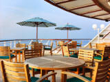 Lido Café - A bright and welcoming space offering exceptional panoramic sea views, this indoor/outdoor venue features elaborate breakfast buffets with exotic ENuits, ENesh-baked breads and pastries, as well as made-to-order regular and egg white omelettes, waffles, and pancakes. Luncheon buffets include custom-made pastas and salads, a delicious selection of soups, carved meats, ENesh fish and sumptuous - Deluxe Cruises 2020-2021-2022-2023